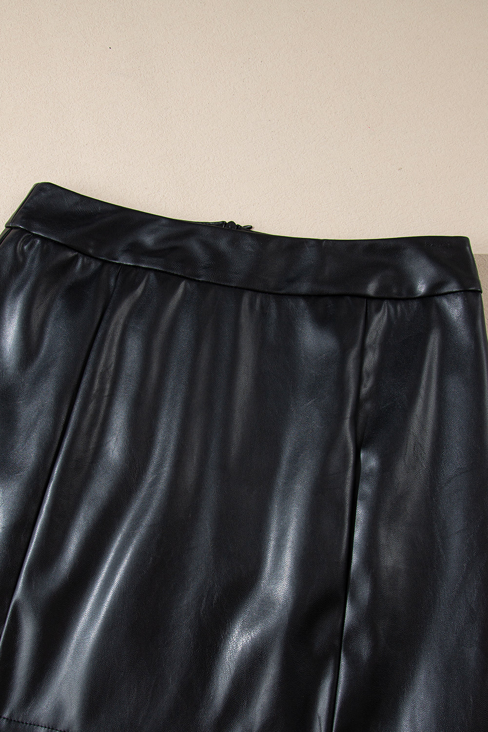 Trendy Women's High Waist Black PU Leather Mini Skirt with Side Slits - Stylish Slim Fit for Chic Looks