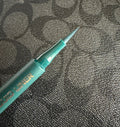 Liquid green precision statement eyeliner