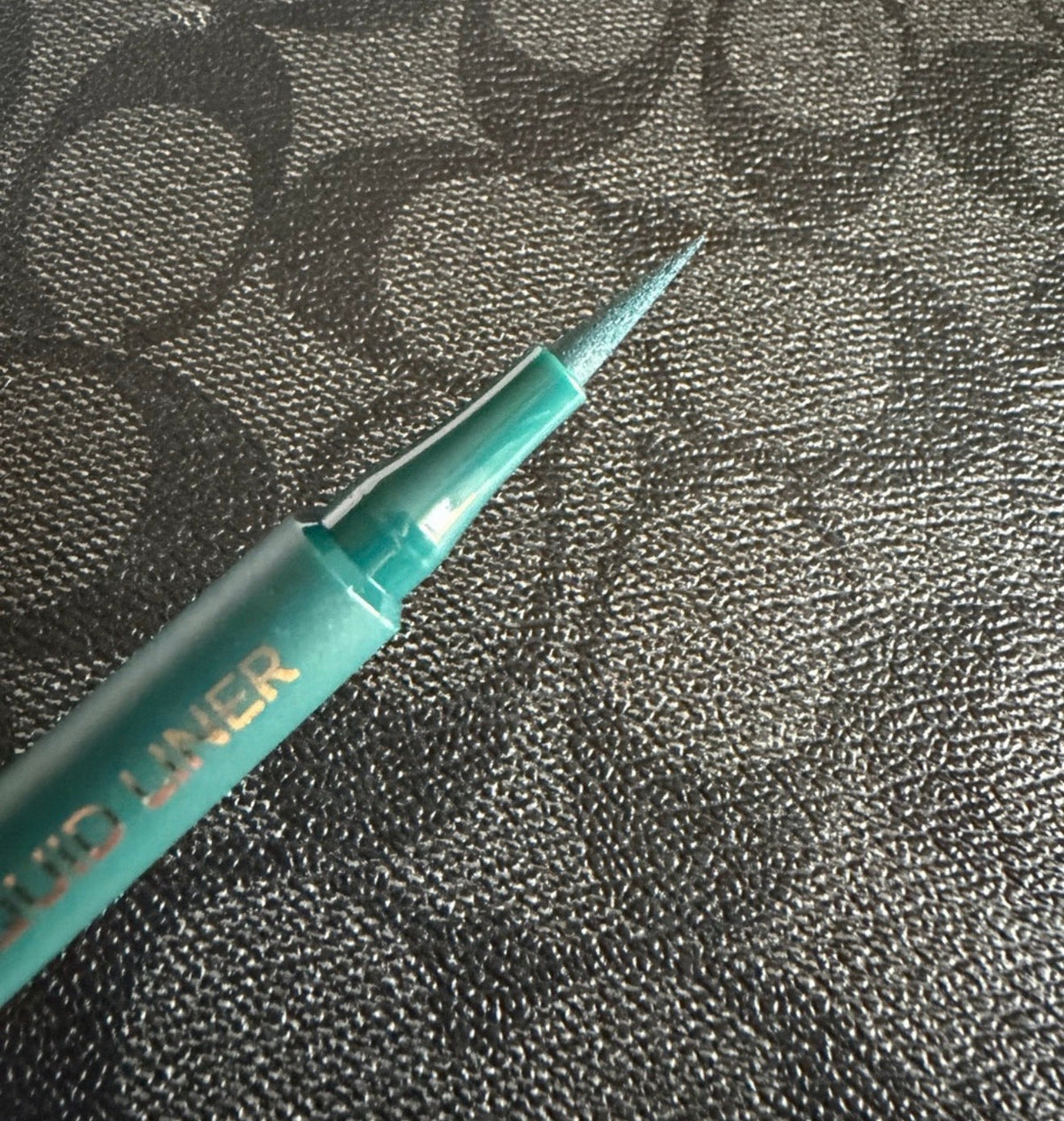 Liquid green precision statement eyeliner