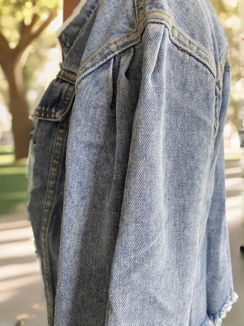 Women's Distressed Cropped Denim Jacket in Light Wash Blue