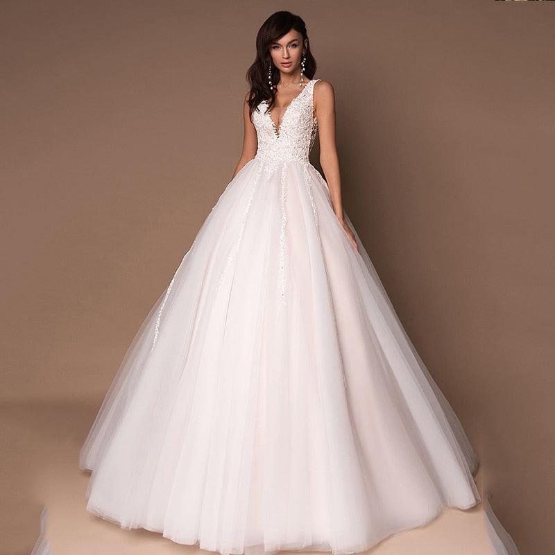 Deep V-Neck Princess Wedding Dress – Puffy Tulle, Beads & Appliqués, Custom Made