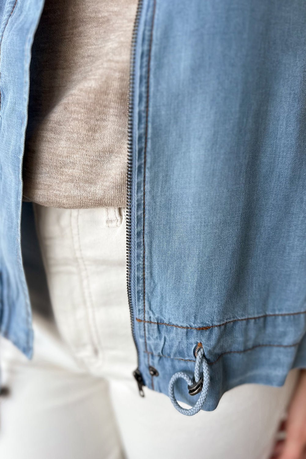 Women's Dusk Blue Denim Jacket with Full Zipper, Collared Design, Drawstring Hem, and Tab Sleeves for a Stylish Fit