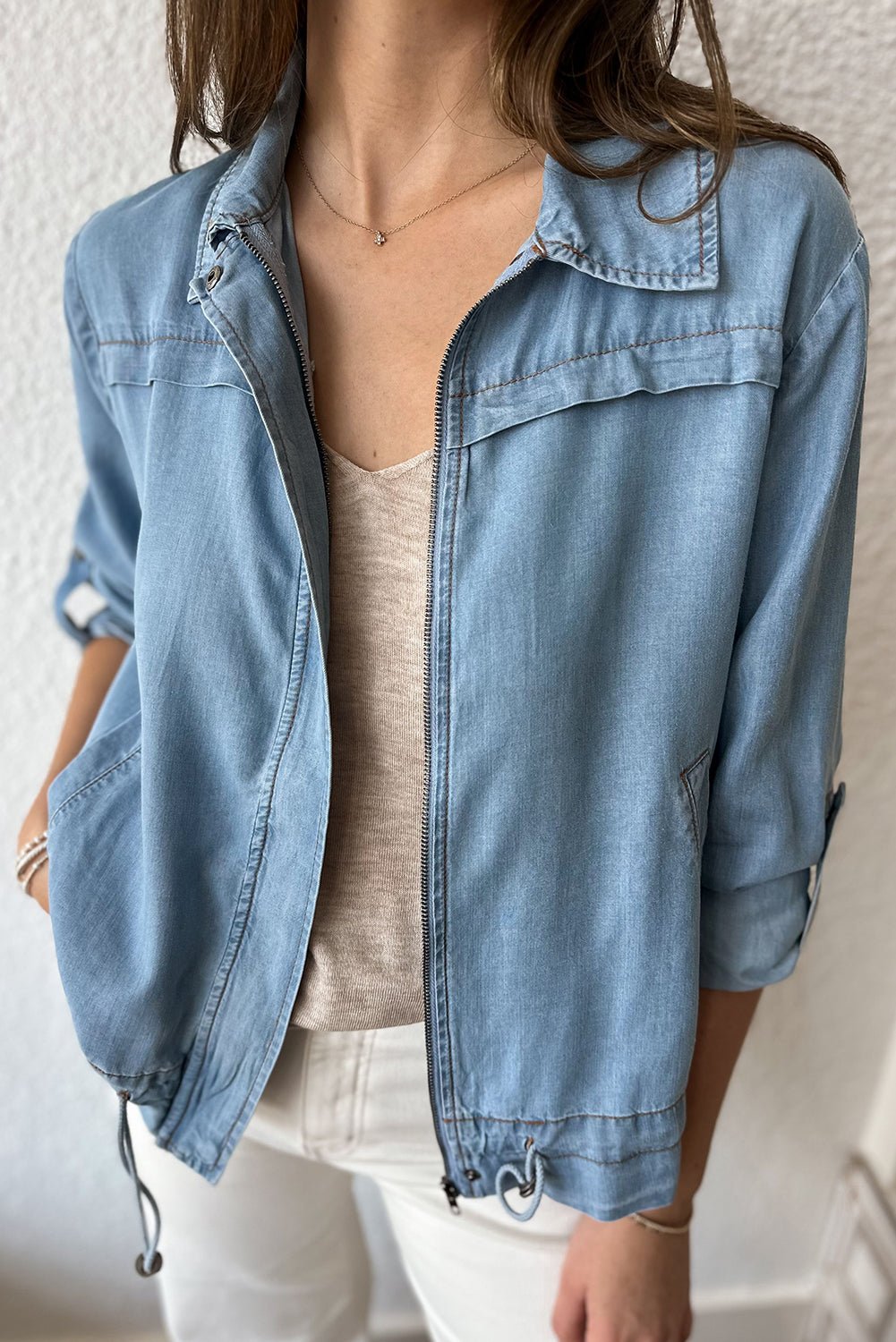 Women's Dusk Blue Denim Jacket with Full Zipper, Collared Design, Drawstring Hem, and Tab Sleeves for a Stylish Fit