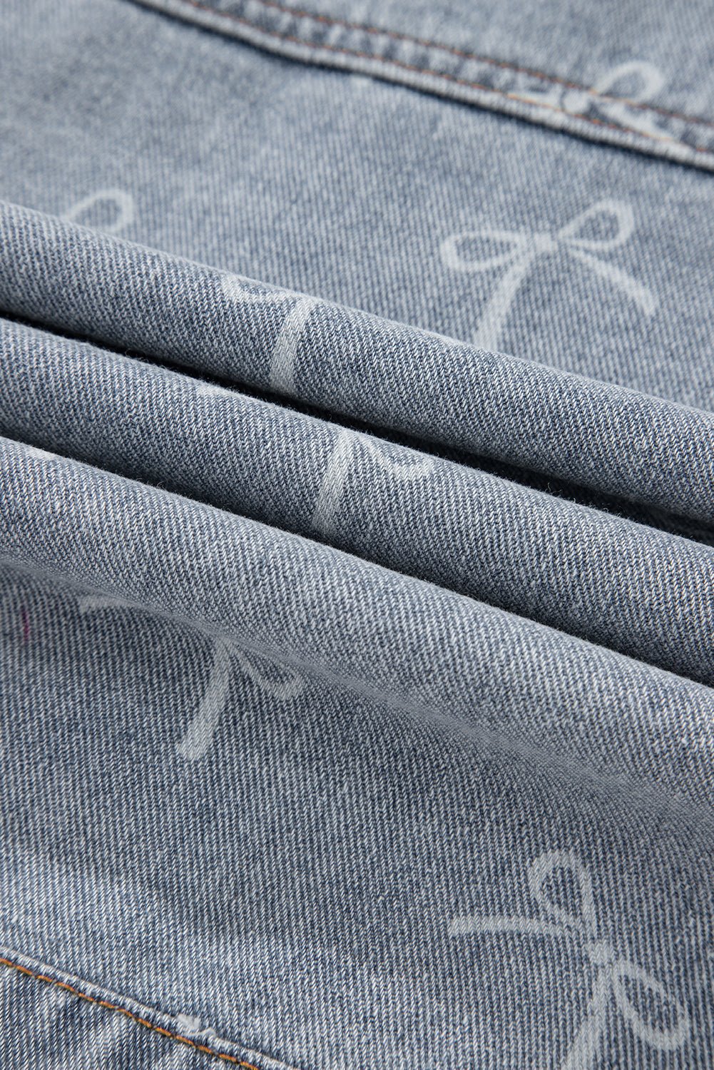 Women's Sky Blue Bow Print Raw Hem Denim Jacket