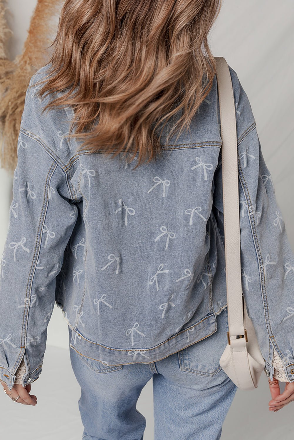 Women's Sky Blue Bow Print Raw Hem Denim Jacket