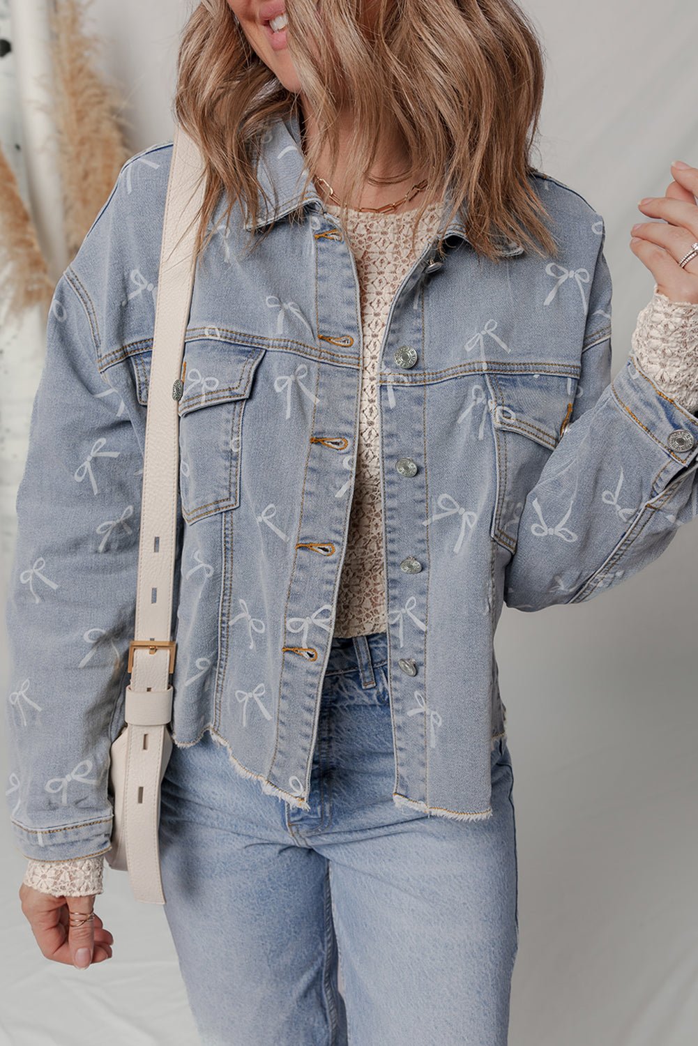 Women's Sky Blue Bow Print Raw Hem Denim Jacket